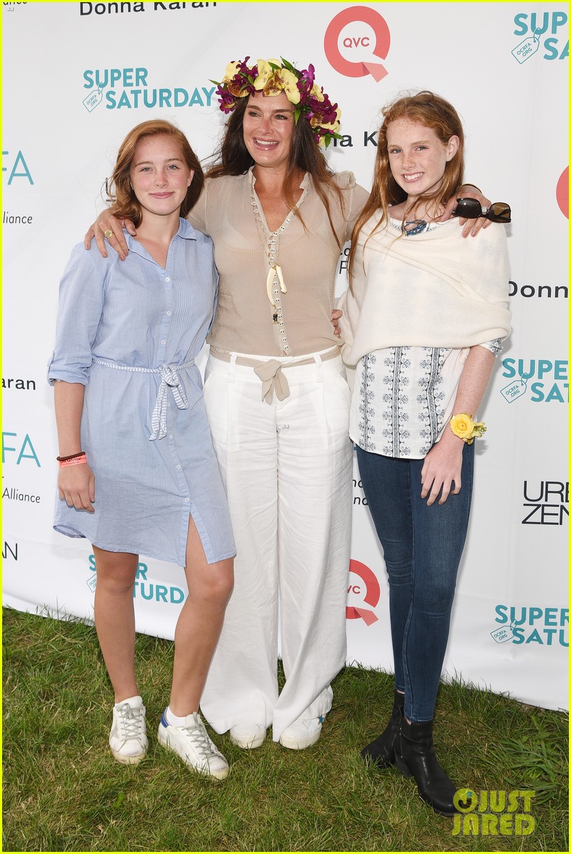 molly sims brooks stuber bring their kids to charity event 023935442