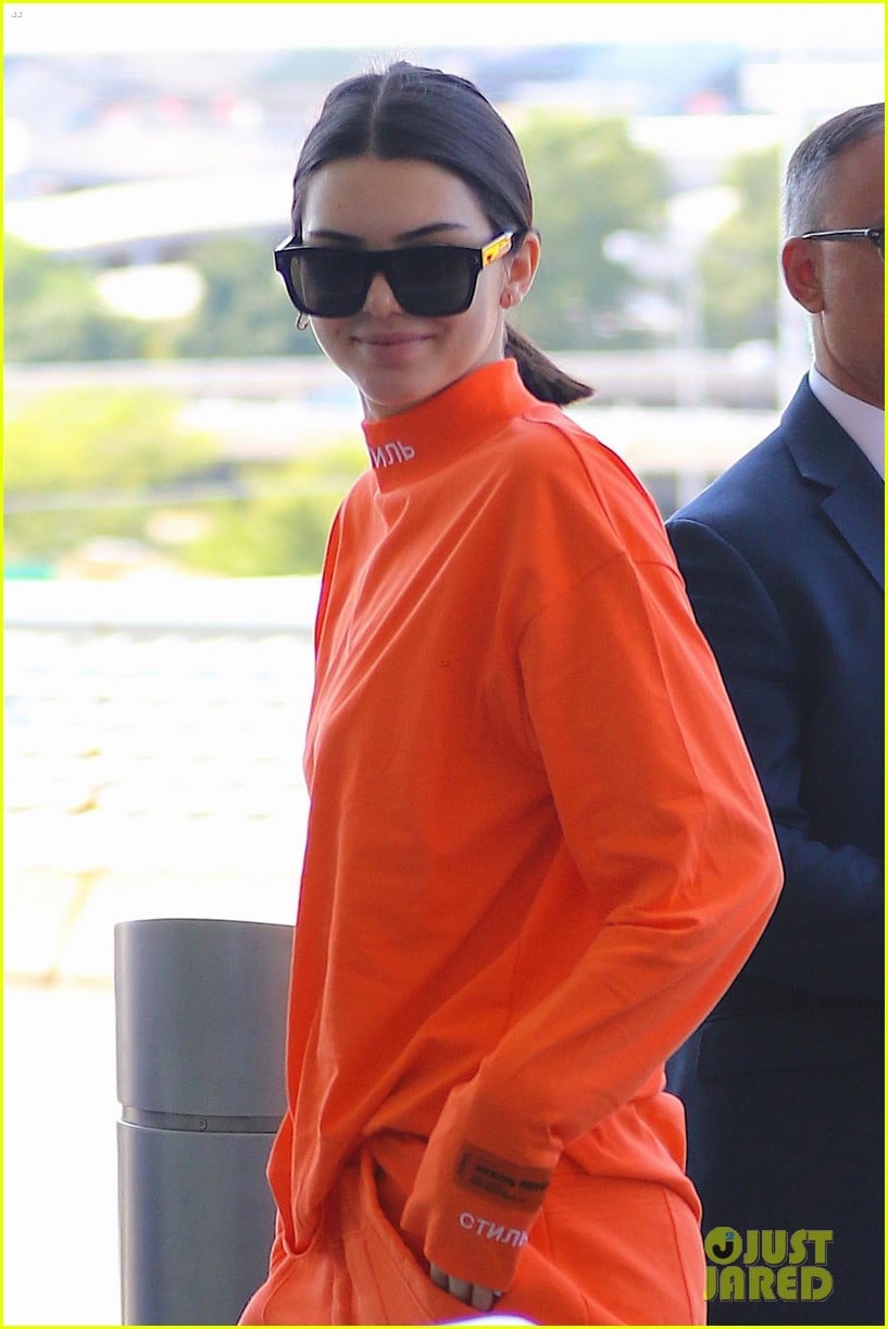 kendall jenner wears all orange for her flight out of new york 093937917