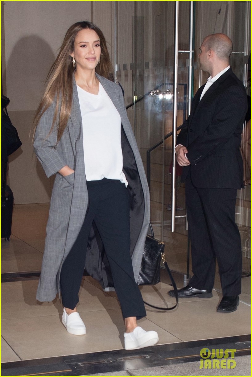 Pregnant Jessica Alba Cradles Baby Bump at 'Project Runway' NYFW Show