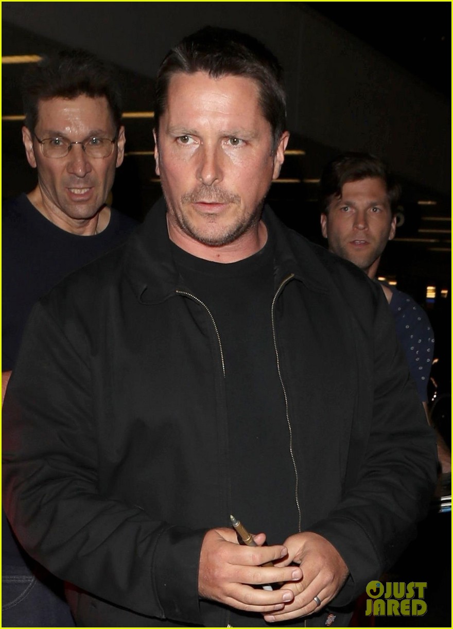 christian bale shows off his filler figure at lax 023956761