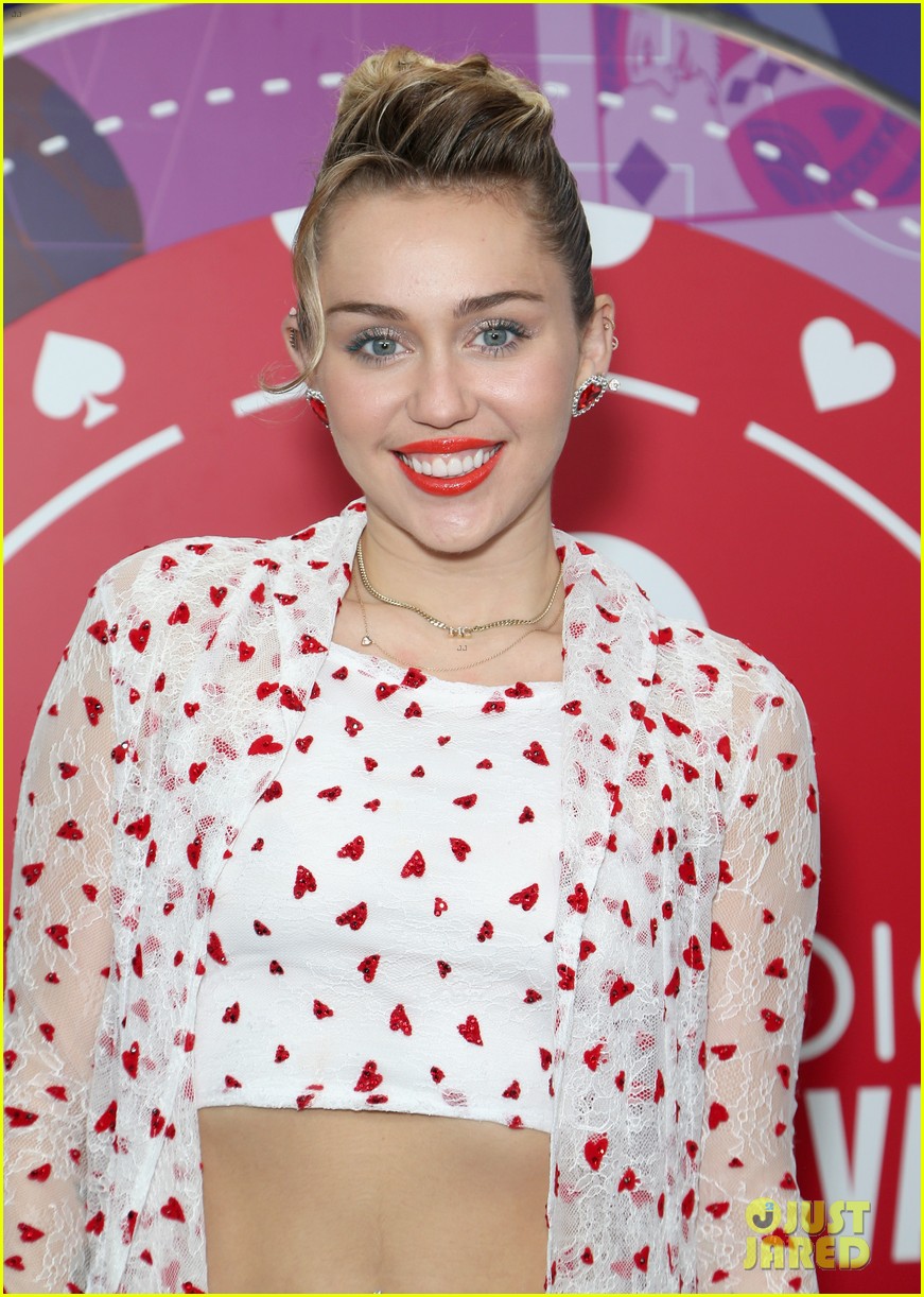 miley cyrus sparkles on stage at iheartradio music festival. 23