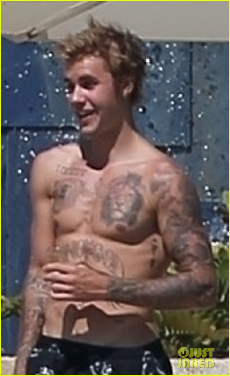 shirtless justin bieber puts toned abs on display in mexico 103972108