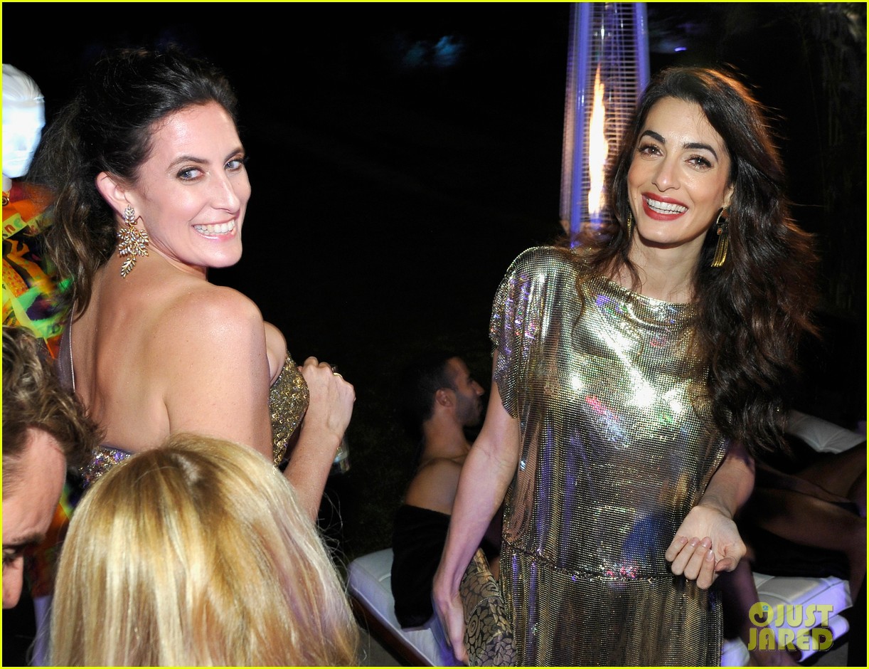 amal clooney has solo girls night out at william vintages gianni versace archive 233968918
