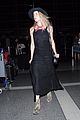 amber heard keeps a low profile for her flight out of law 06