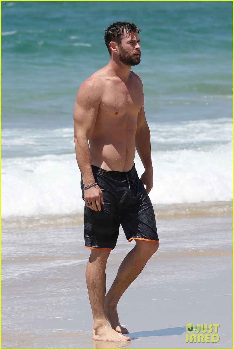 chris hemsworth goes shirtless at beach in australia 243972264