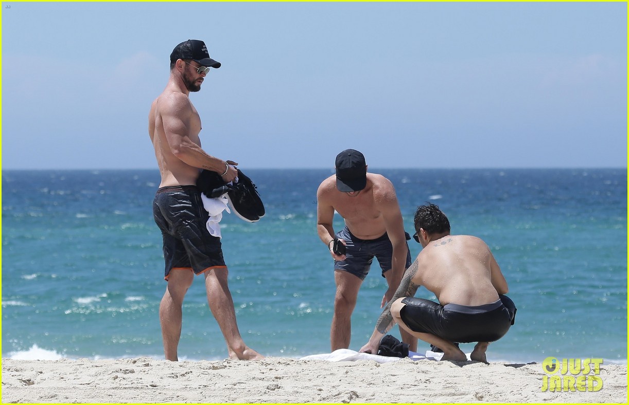 chris hemsworth goes shirtless at beach in australia 253972265