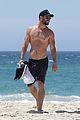 chris hemsworth goes shirtless at beach in australia 01