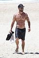 chris hemsworth goes shirtless at beach in australia 05