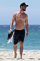 chris hemsworth goes shirtless at beach in australia 06