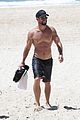 chris hemsworth goes shirtless at beach in australia 08
