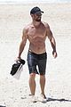 chris hemsworth goes shirtless at beach in australia 09