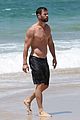chris hemsworth goes shirtless at beach in australia 11