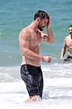 chris hemsworth goes shirtless at beach in australia 14