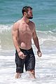 chris hemsworth goes shirtless at beach in australia 17
