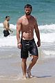 chris hemsworth goes shirtless at beach in australia 20