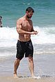 chris hemsworth goes shirtless at beach in australia 22