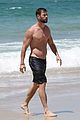 chris hemsworth goes shirtless at beach in australia 23