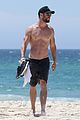 chris hemsworth goes shirtless at beach in australia 26
