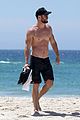 chris hemsworth goes shirtless at beach in australia 27