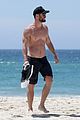 chris hemsworth goes shirtless at beach in australia 28