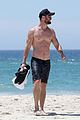 chris hemsworth goes shirtless at beach in australia 29
