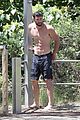 chris hemsworth goes shirtless at beach in australia 32