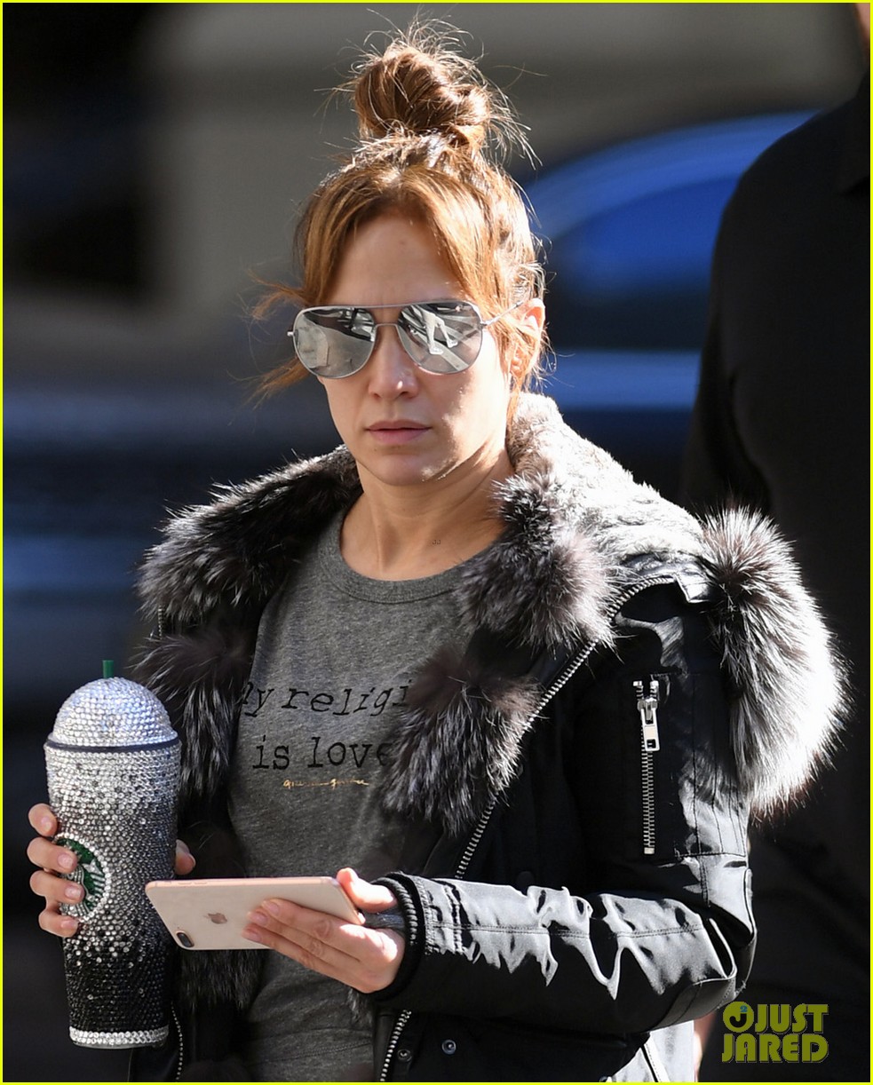 jennifer lopez slays with furry coat and bedazzled starbucks cup 103975739