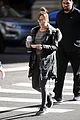 jennifer lopez slays with furry coat and bedazzled starbucks cup 02