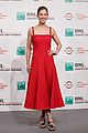 rosamund pike wows in red dress at hostiles photocall 01