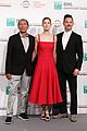 rosamund pike wows in red dress at hostiles photocall 03