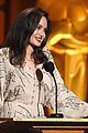 angelina jolie speaks on stage while presenting at governors awards 02