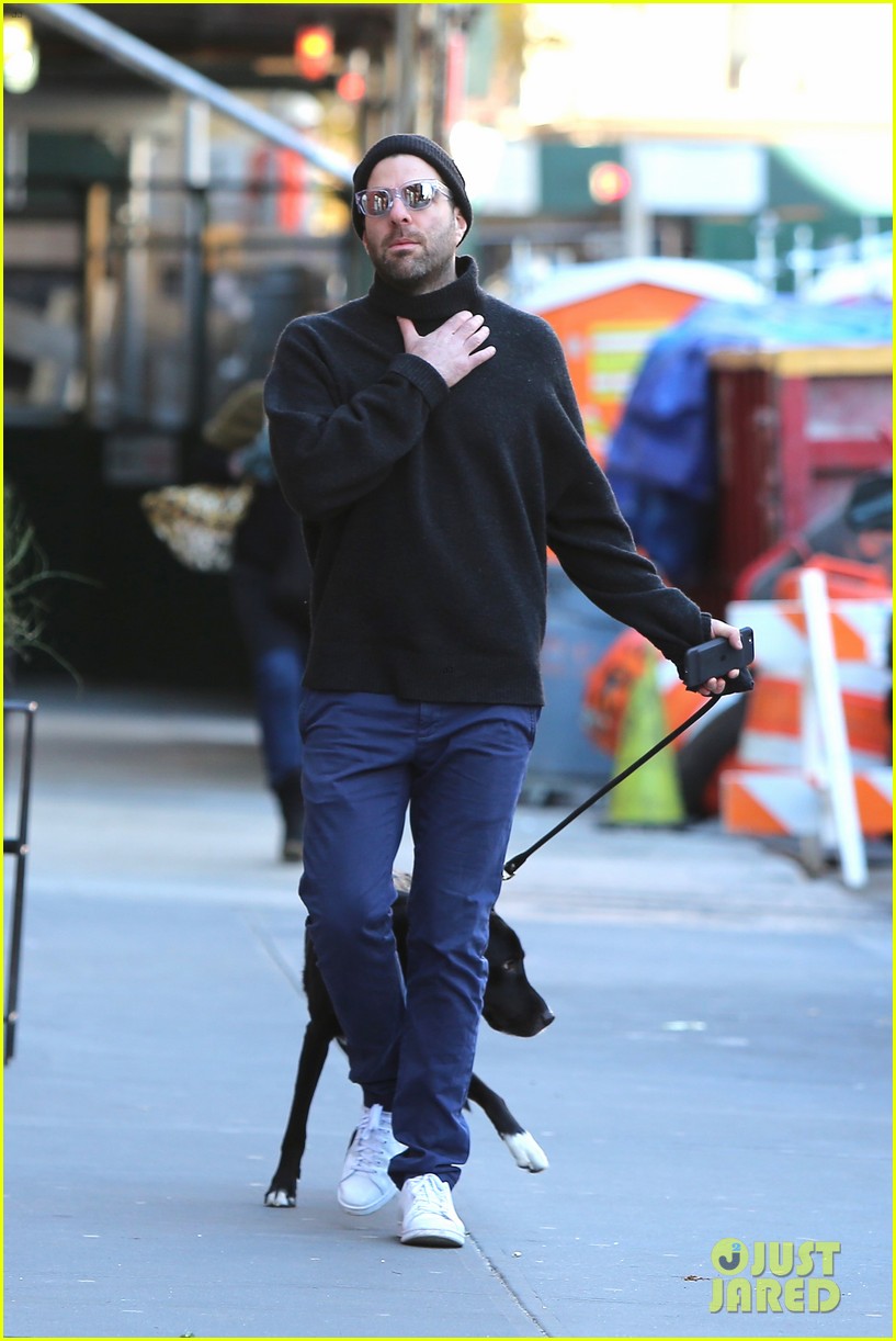 zachary quinto takes his dog for a walk in nyc 103993867