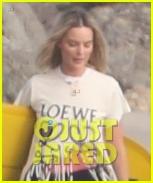 margot robbie poses for a photo shoot on a beach in malibu 023984708