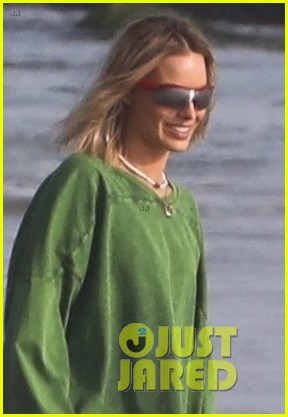 margot robbie poses for a photo shoot on a beach in malibu 043984710