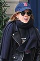 emma watson tries to keep a low profile while out and about in paris 03