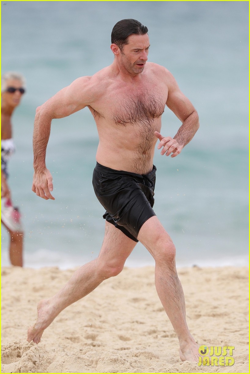 hugh jackman goes shirtless at the beach with his hot trainer 15