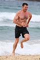 hugh jackman goes shirtless at the beach with his hot trainer 01