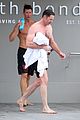 hugh jackman goes shirtless at the beach with his hot trainer 05