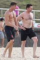 hugh jackman goes shirtless at the beach with his hot trainer 06