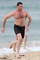 hugh jackman goes shirtless at the beach with his hot trainer 10