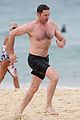 hugh jackman goes shirtless at the beach with his hot trainer 14