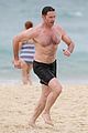 hugh jackman goes shirtless at the beach with his hot trainer 18