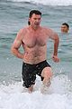 hugh jackman goes shirtless at the beach with his hot trainer 22