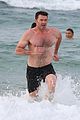 hugh jackman goes shirtless at the beach with his hot trainer 23