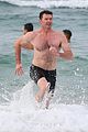 hugh jackman goes shirtless at the beach with his hot trainer 24