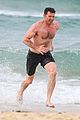 hugh jackman goes shirtless at the beach with his hot trainer 34