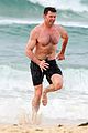 hugh jackman goes shirtless at the beach with his hot trainer 37