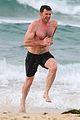 hugh jackman goes shirtless at the beach with his hot trainer 38