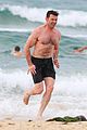 hugh jackman goes shirtless at the beach with his hot trainer 39