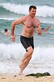 hugh jackman goes shirtless at the beach with his hot trainer 40